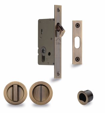 Click Here To Enlarge This Photo Of RD2308-50-AT Heritage Brass Sliding Door Lock c&sol;w Round Privacy Turns Antique Brass &lpar;50mm backset&rpar;