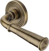 RR1935-AT Heritage Brass Door Handle Lever Latch on Round Rose Bridgetown Reeded Design Antique Brass finish