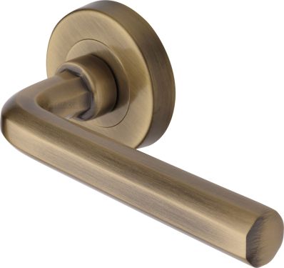 Click Here To Enlarge This Photo Of V4545-AT Heritage Brass Door Handle Lever Latch on Round Rose Octave Design Antique Brass finish