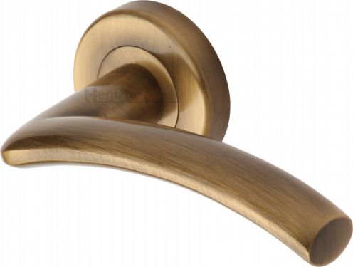 Click Here To Enlarge This Photo Of V3490-AT Heritage Brass Door Handle Lever Latch on Round Rose Centaur Design Antique Brass Finish