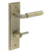 BUR-30AB-456AB-82AB Frelan Hardware Burlington 'Westminster' Door Handles on 78mm DIN Bathroom Backplate with Antique Brass Easy Turn & Release
