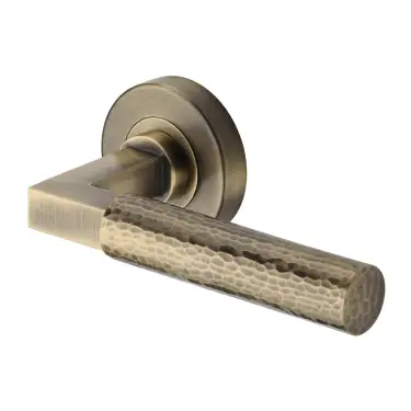 Click Here To Enlarge This Photo Of HAM2259-AT Heritage Brass Door Handle Lever on Rose Hammered Bauhaus Design Antique Brass Finish