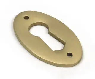 52456 From The Anvil Satin Brass Oval Escutcheon