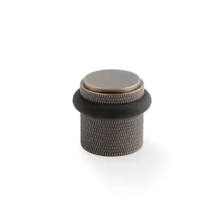 AW639KAB - Alexander & Wilks Brunel Knurled Floor Mounted Door Stop - Antique Brass